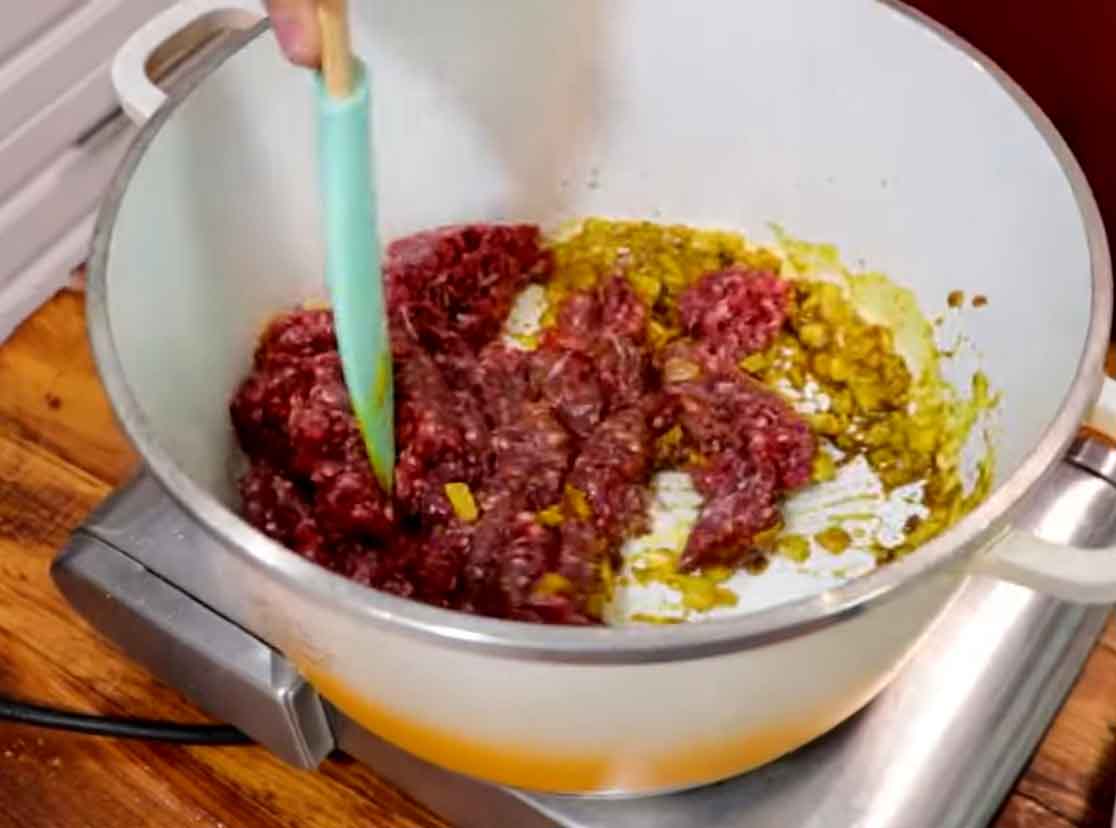 add minced meat to onions
