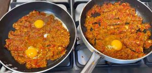 adding eggs to pan and fry with mizaghasemi