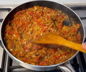 frying tomato and eggplant for mirzaghasemi