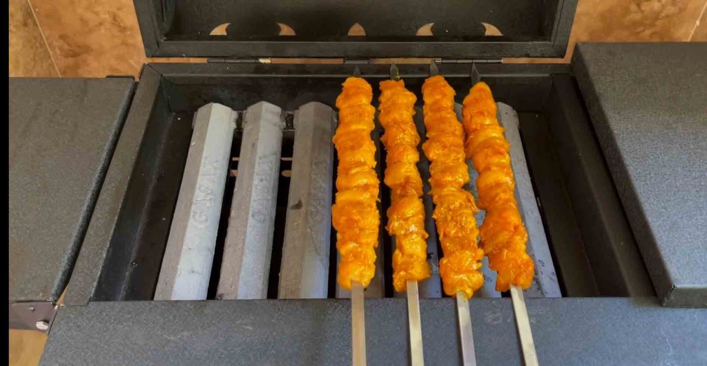 put the skewers on the grill