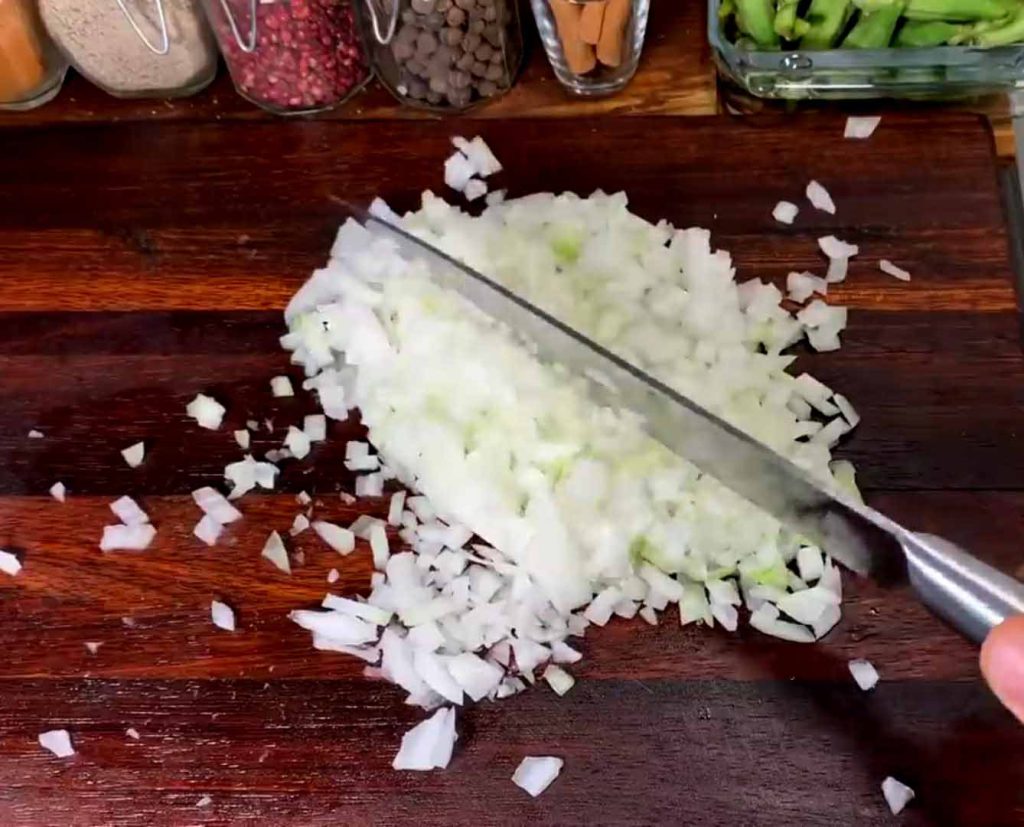 Finely chopped onions and garlic for Persian stew base