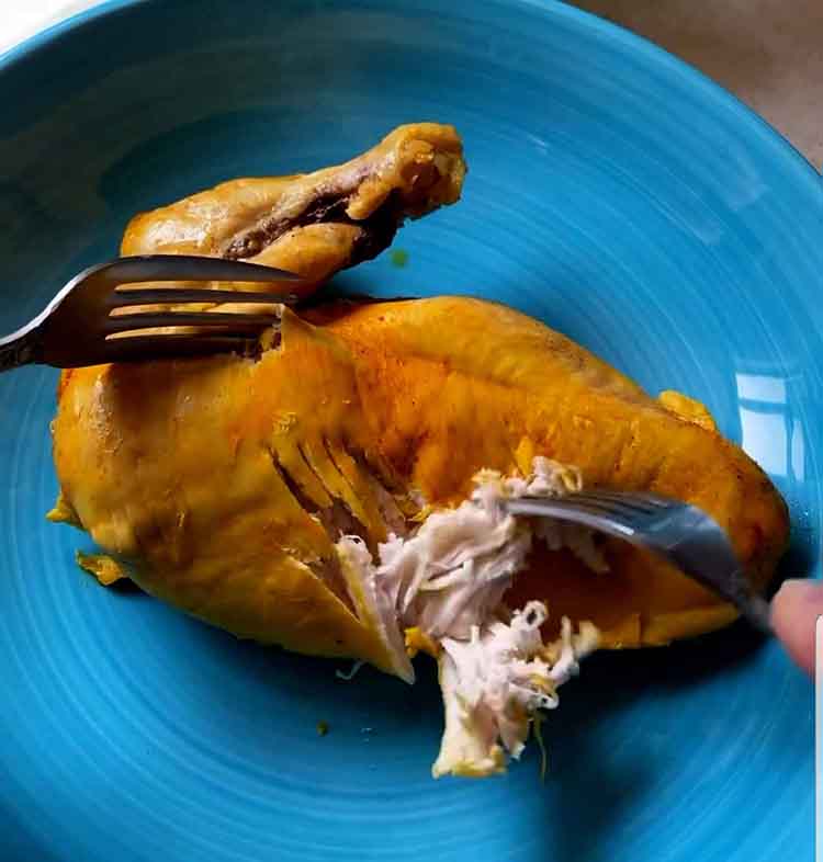 Shredding cooked chicken