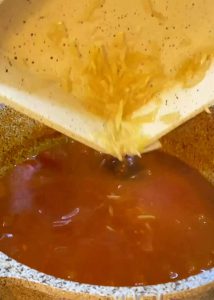 Now add the almond slices to the stew