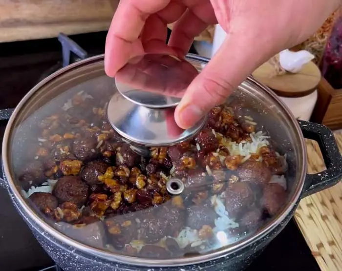 cooking all ingredients with rice