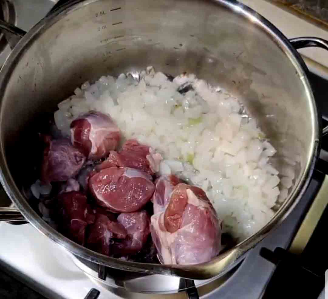 add the mutton to the fried onions
