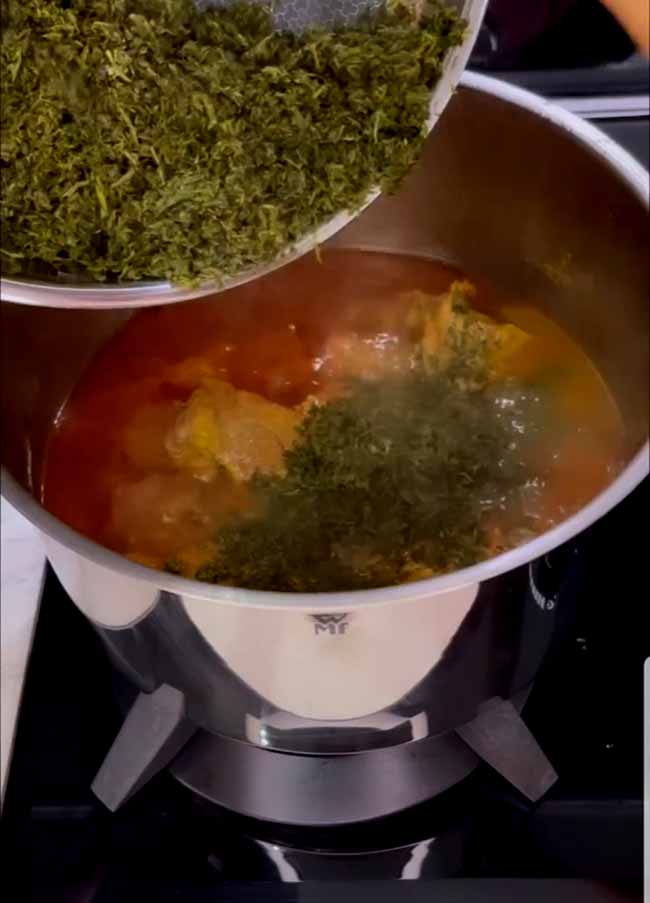 Add mint and parsley to the stew