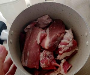 add the veal to the pot