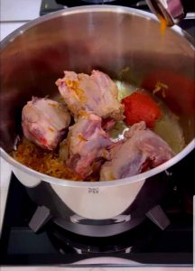 add tomato paste and spices
