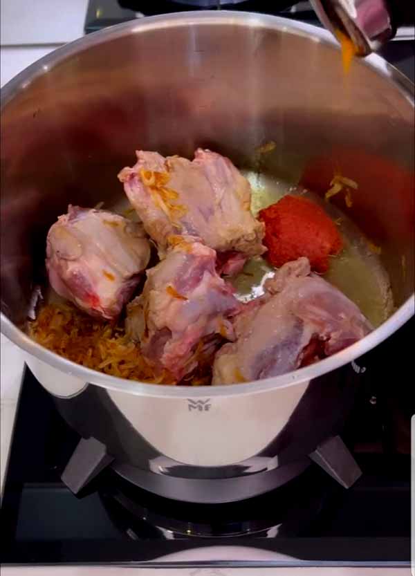 add tomato paste and spices