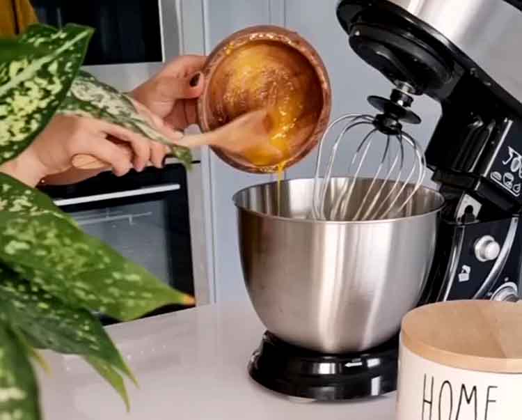 add egg yolk to mixer