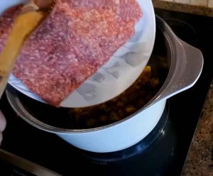 add minced meat to sauce