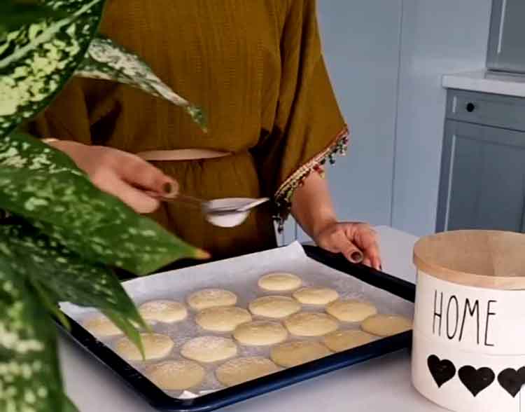 sift powdered sugar over the cookies
