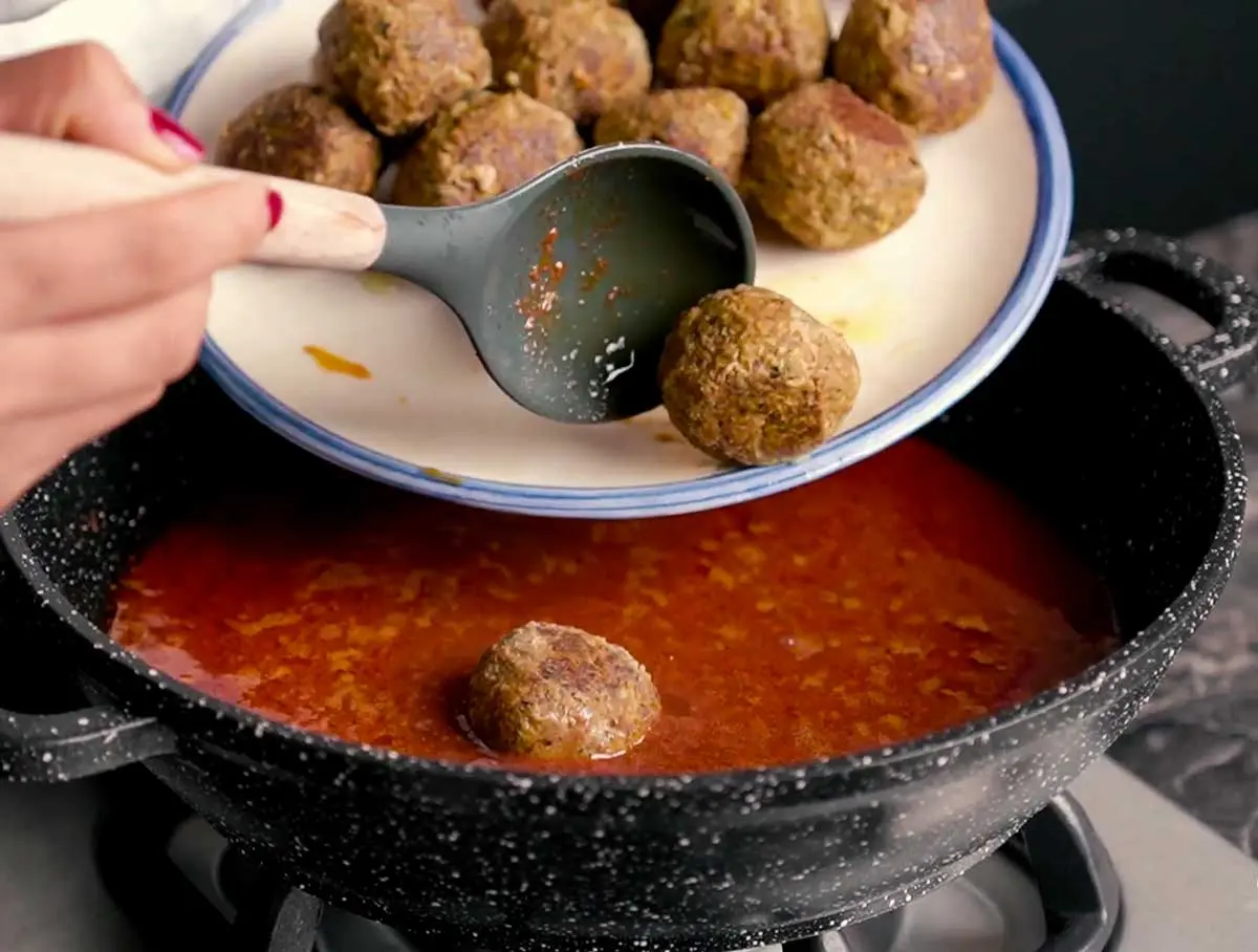 add meatballs to the sauce