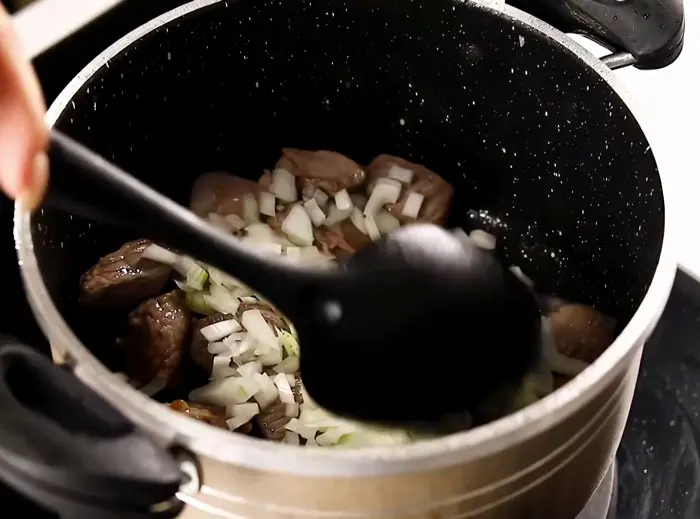 add onions to meat and frying