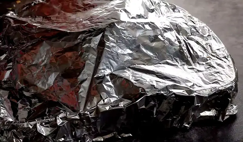 Oven-baked chicken in foil